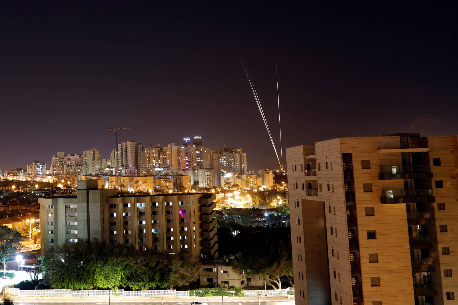 Streaks of light are pictured as rockets are launched from the Gaza Strip towards Israel, as seen from the Israeli city of Ashkelon