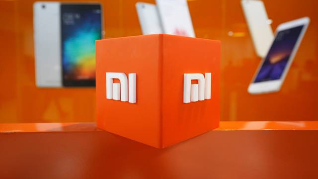 FILE PHOTO: The logo of Xiaomi is seen inside the company's office in Bengaluru