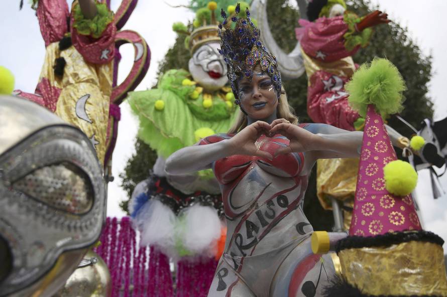 A performer participates in the parade at the Notting Hill Carnival in London
