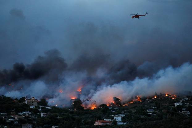 Wildfire burns in Rafina, near Athens