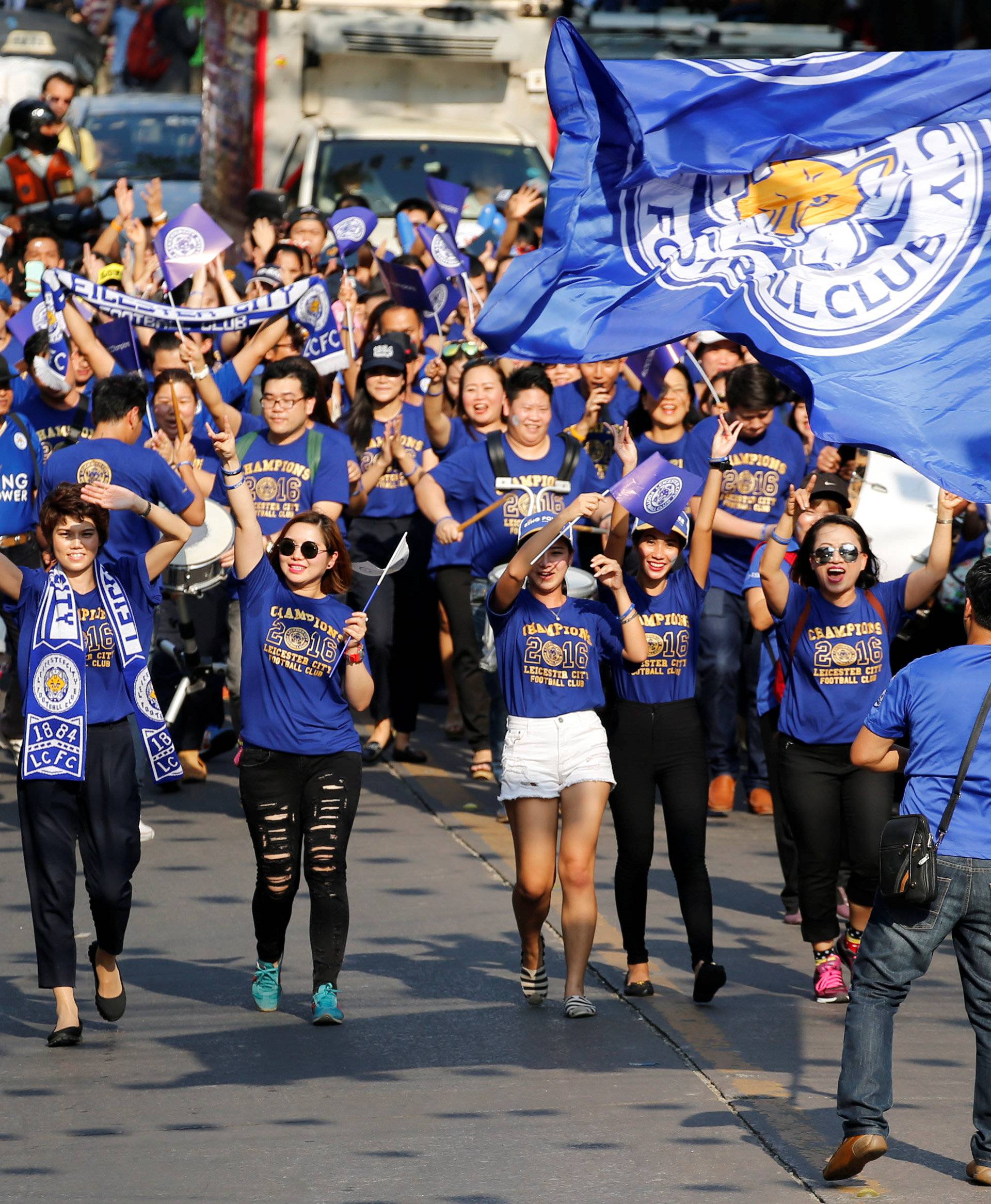 Leicester City soccer club's fans take part in a parade to celebrate club's English Premier League title in Bangkok