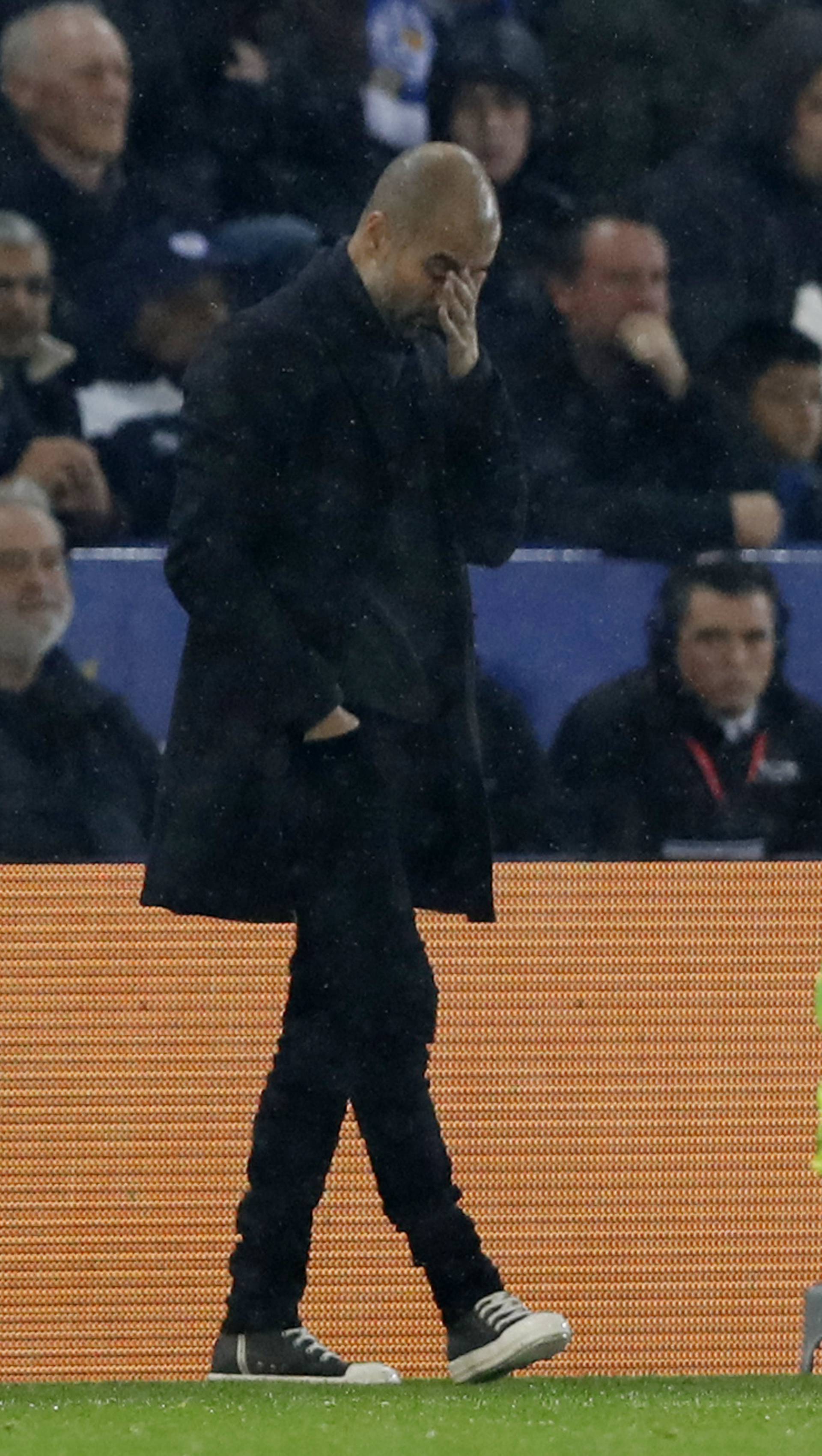 Manchester City manager Pep Guardiola looks dejected