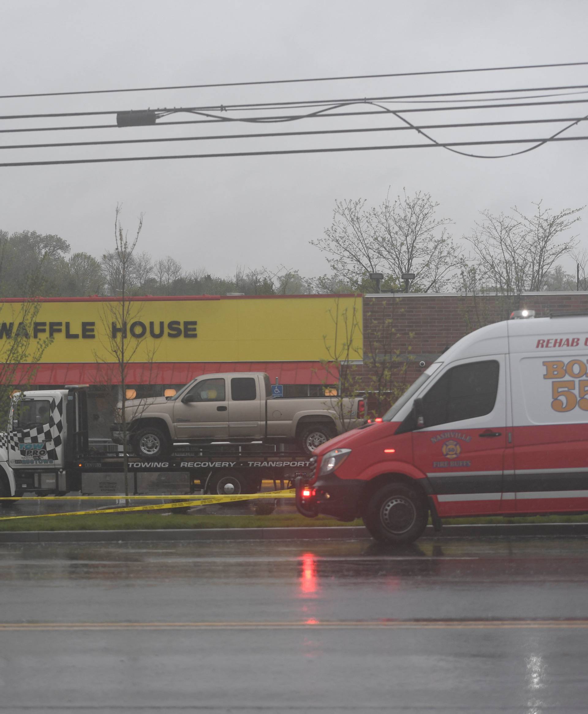 The truck of Travis Reinking, the suspected shooter, is loaded on a trailer ready to be towed from the scene of a fatal shooting at a Waffle House restaurant near Nashville, Tennessee