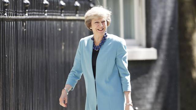 Britain's Prime Minister Theresa May arrives at 10 Downing Street, in central London