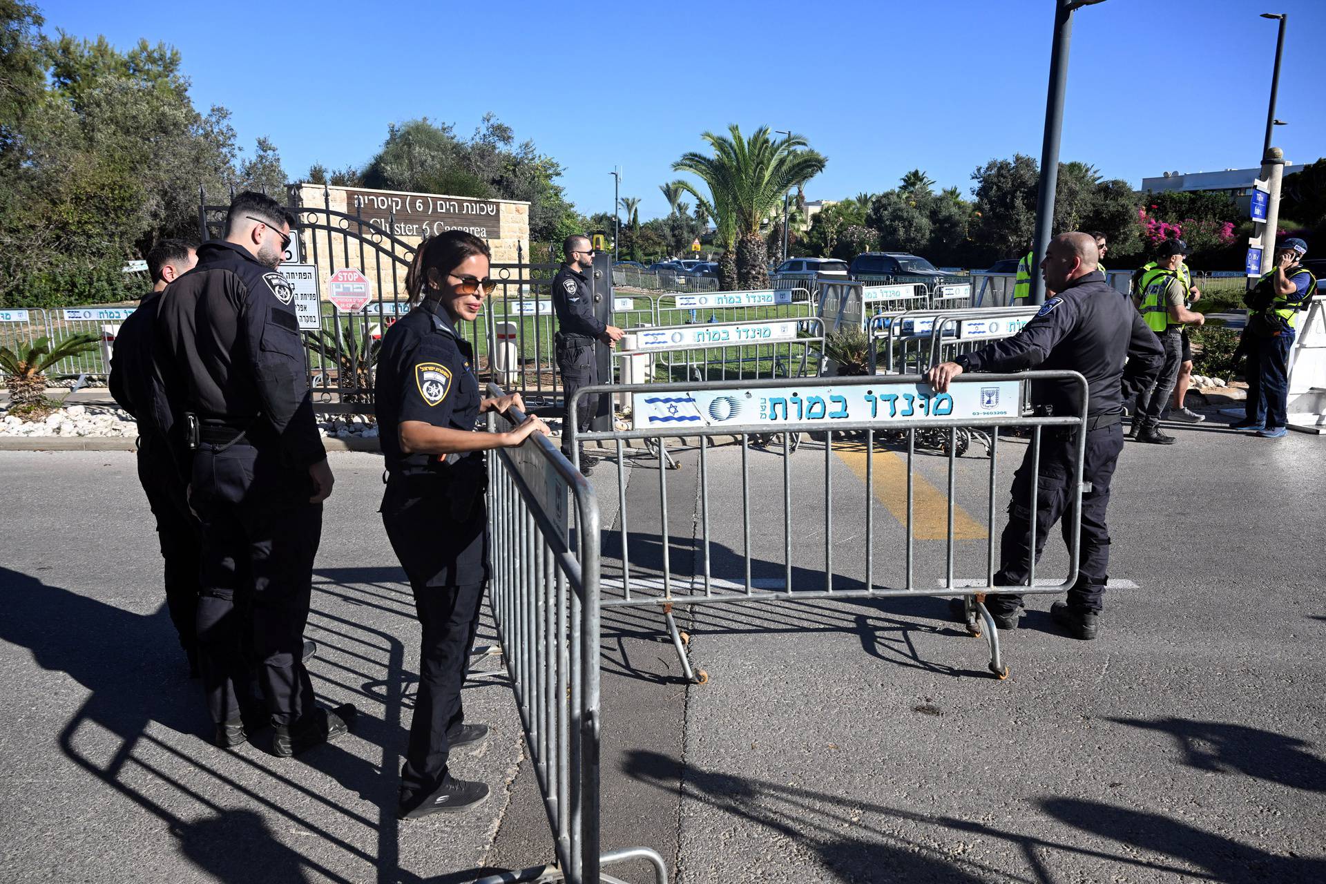 Israeli police set a roadblock on a street in Caesarea following drone attack from Lebanon