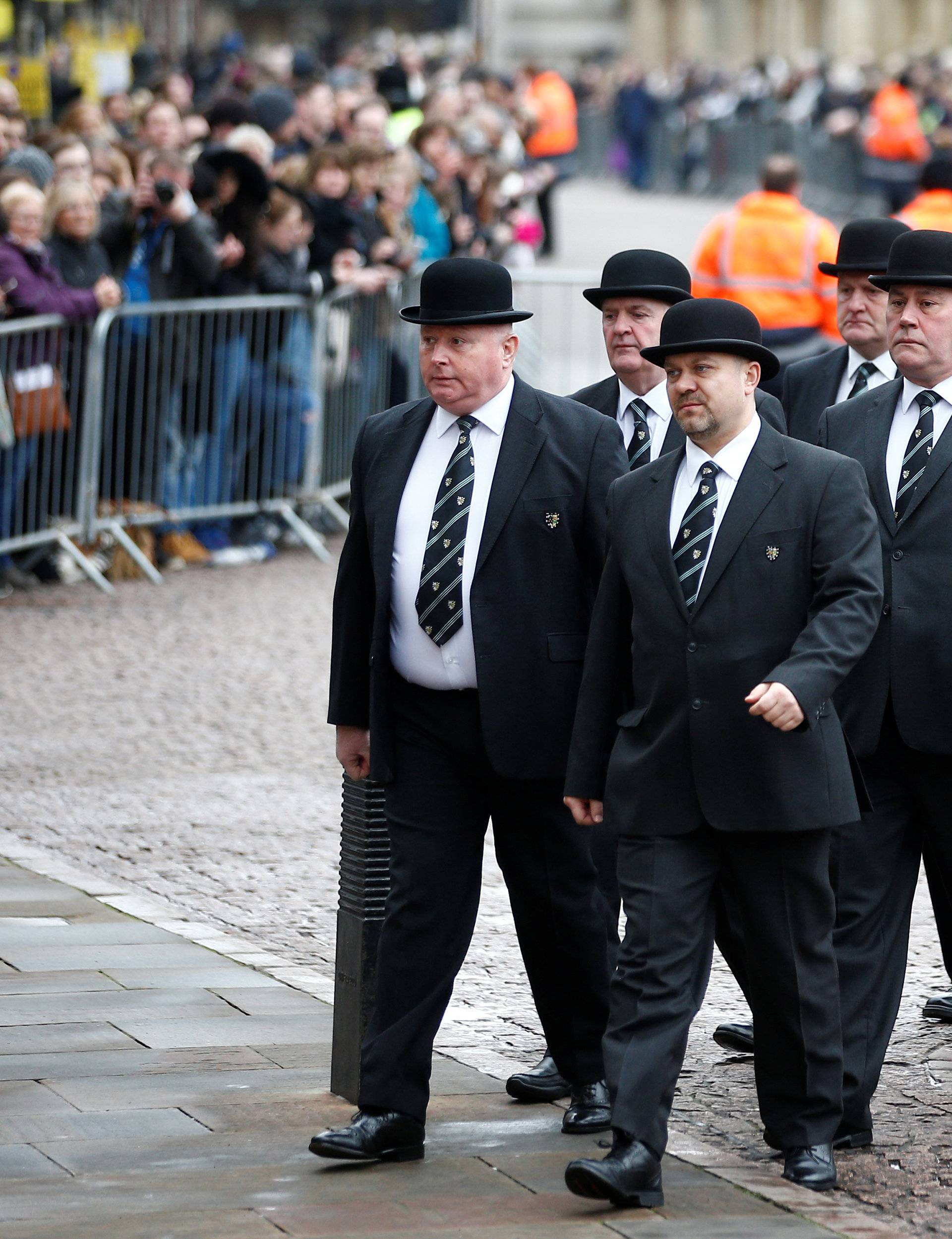 University of Cambridge college porters arrive at Great St Marys Church, where the funeral of theoretical physicist Prof Stephen Hawking is being held, in Cambridge