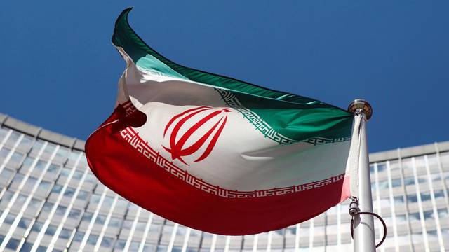 FILE PHOTO: An Iranian flag flutters in front of the UN headquarters in Vienna