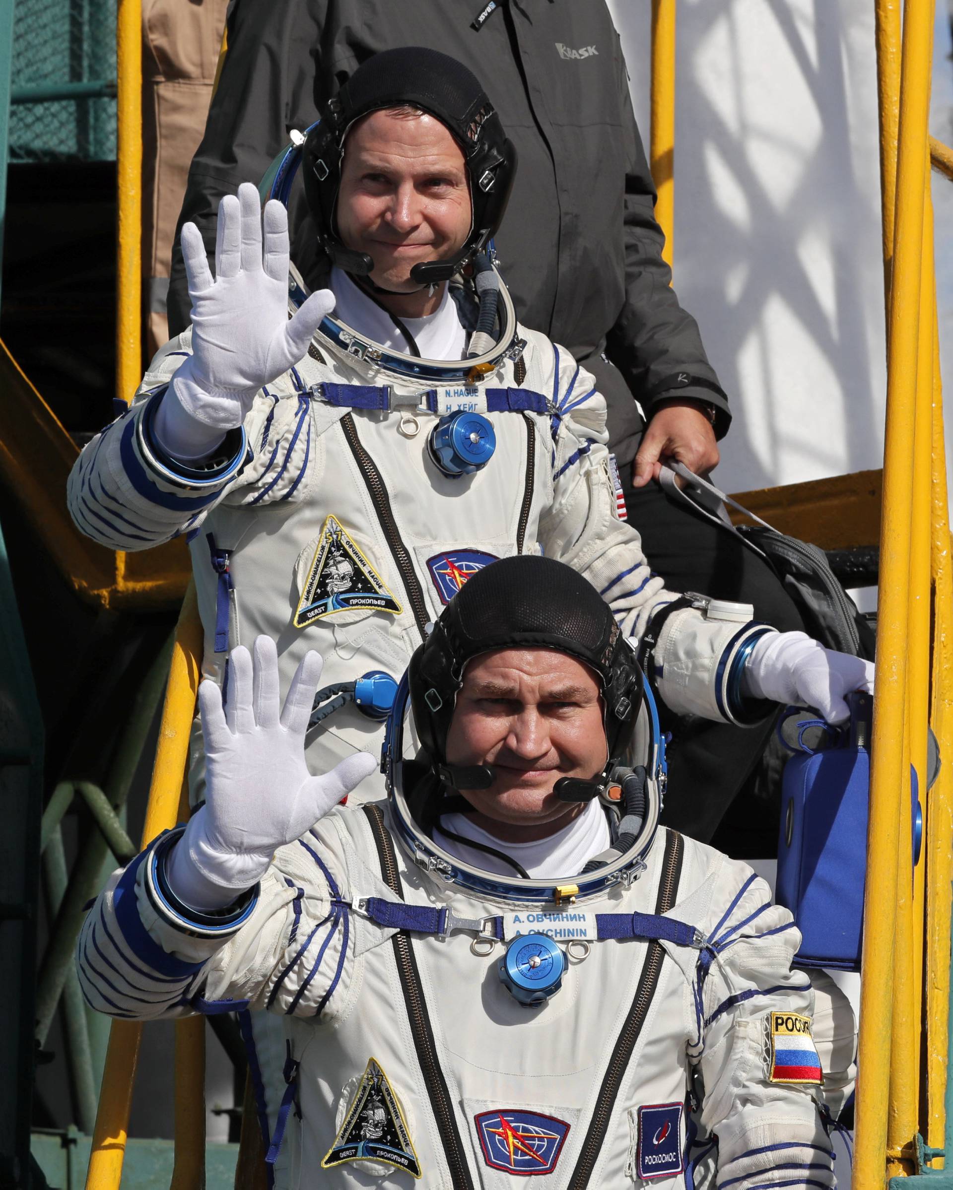 International Space Station (ISS) crew members board the Soyuz MS-10 spacecraft for the launch at the Baikonur Cosmodrome, Kazakhstan