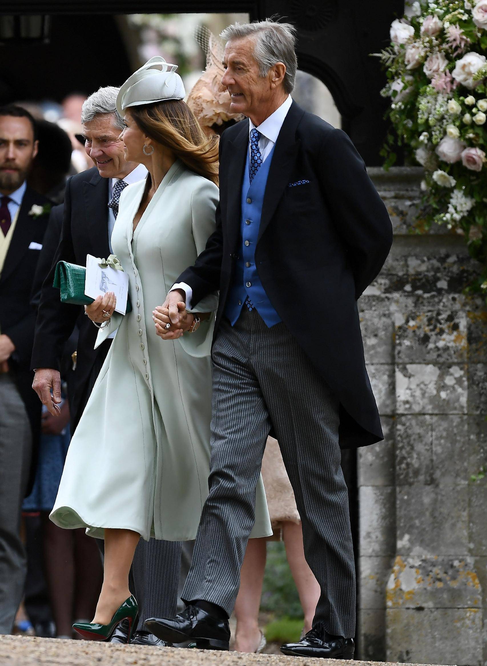 FILE PHOTO: FILE PHOTO: Carole Middleton and her husband Michael Middleton leave after attending the wedding of their daughter Pippa Middleton to James Matthews at St Mark's Church in Englefield