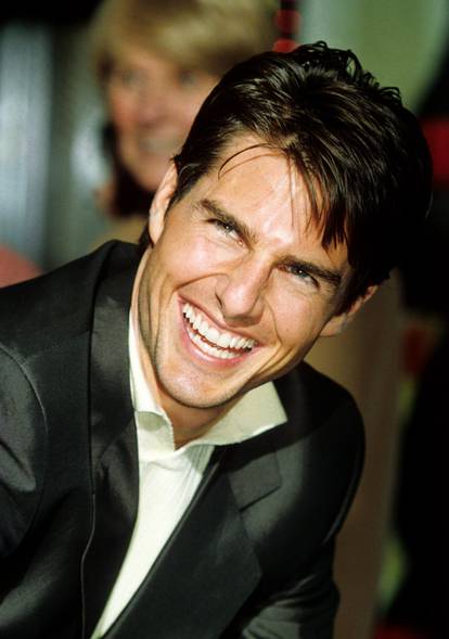 FOTO Tom Cruise veselo mahao fanovima u Londonu: Evo kako je izgledao na početku karijere