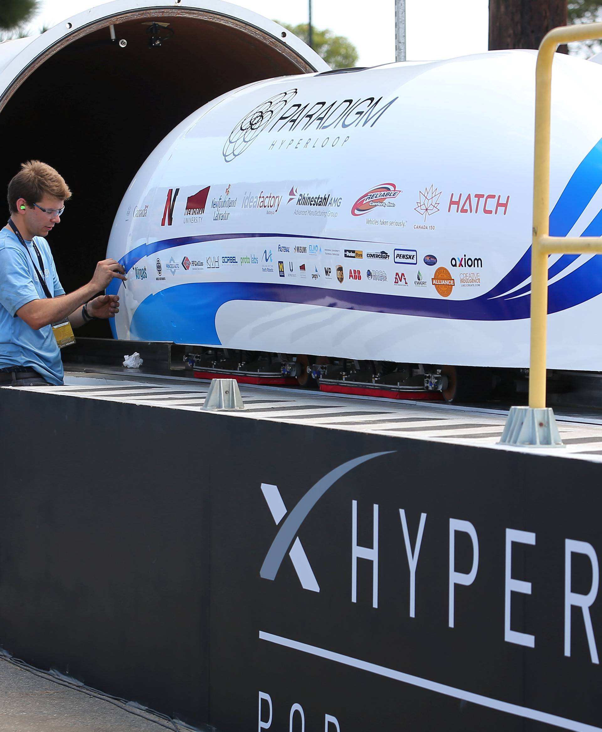 Paradigm Hyperloop team from Memorial University in Newfoundland, Canada prepare to run their hyperpod at SpaceX's Hyperloop Pod Competition II in Hawthorne