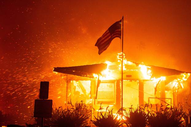 Palisades Fire burns during a windstorm on the west side of Los Angeles