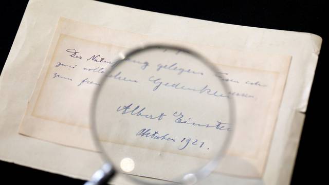 A note written by Albert Einstein to Italian chemistry student Elisabetta Piccini in Florence, Italy, in 1921 is seen before it is sold at an auction in Jerusalem