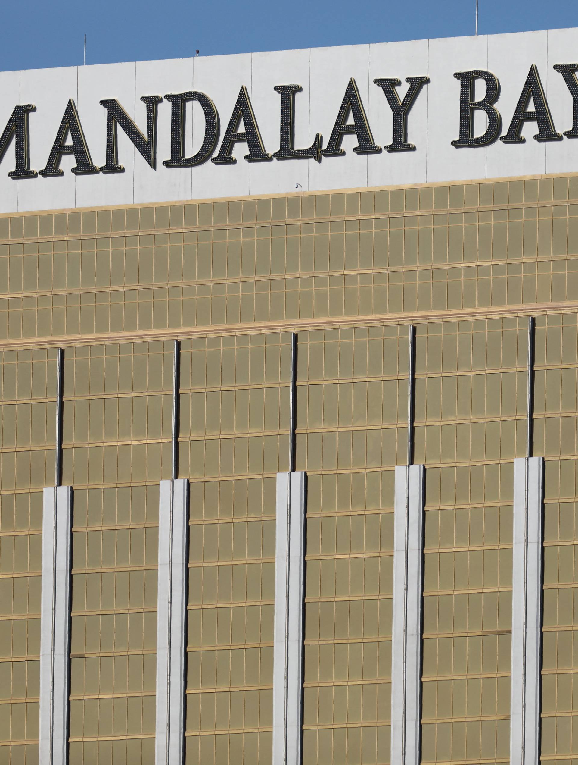 Two broken windows are seen at The Mandalay Bay Resort and Casino following a mass shooting at the Route 91 Festival in Las Vegas
