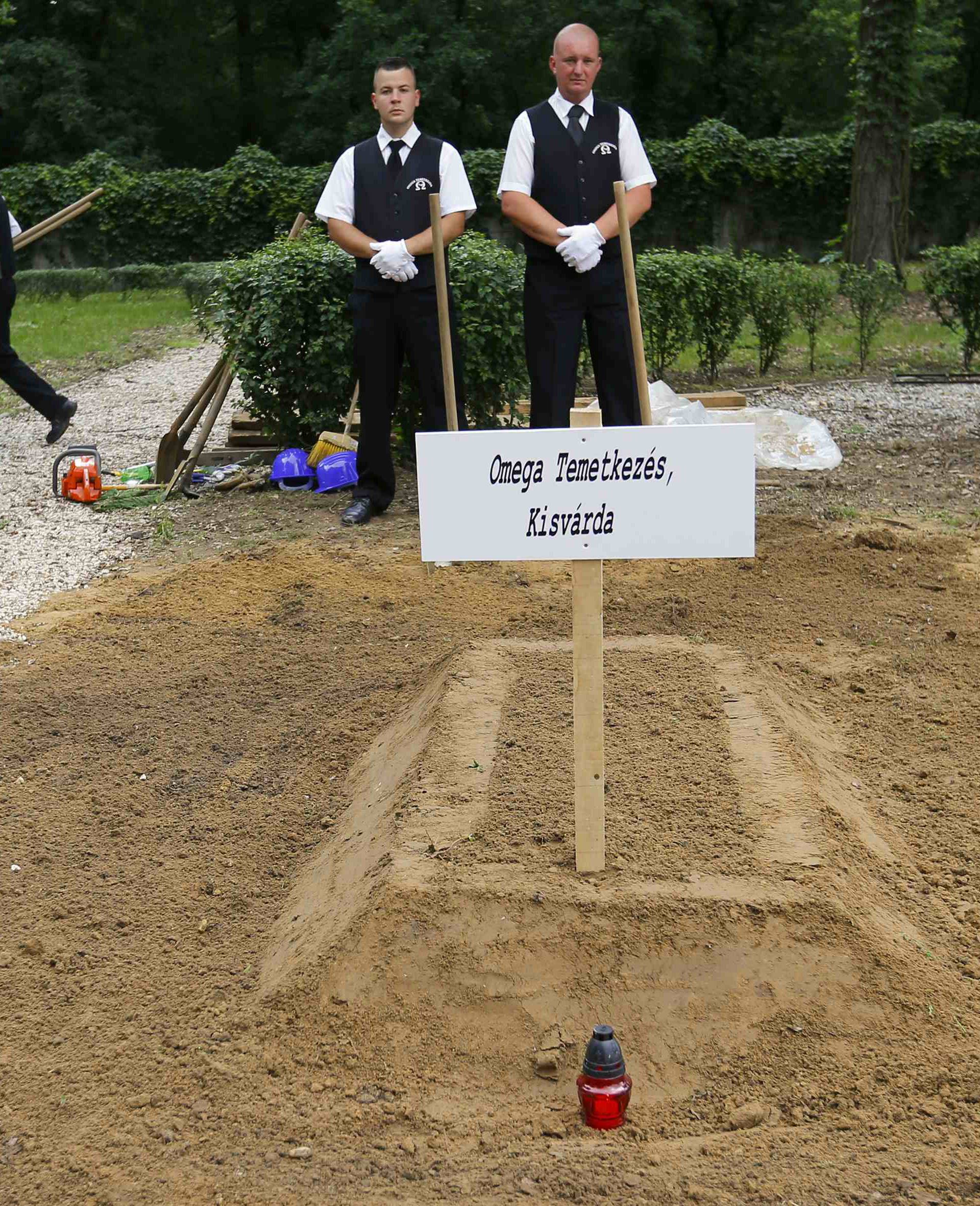Gravediggers pose after Hungarian grave digging championship in Debrecen
