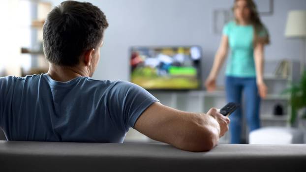 Woman,Quarreling,,Man,Watching,Football,Match,,Ignoring,Conflict,,Relationship