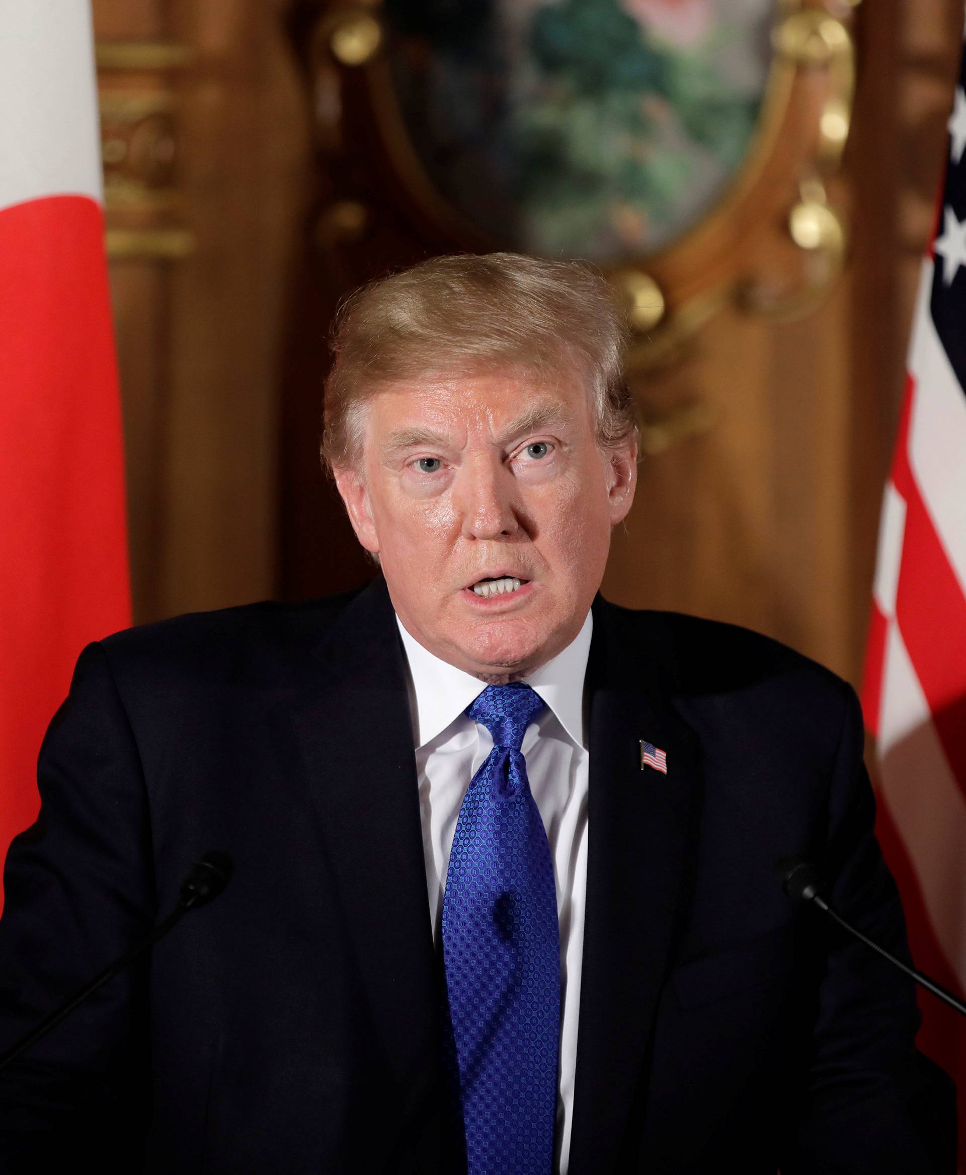 U.S. President Donald Trump speaks during a news conference with Japan's Prime Minister Shinzo Abe at Akasaka Palace in Tokyo