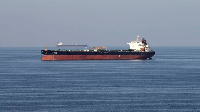 FILE PHOTO: Oil tankers pass through the Strait of Hormuz