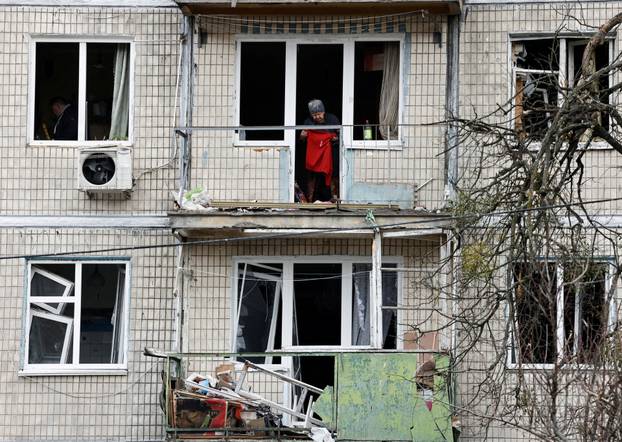 Aftermath of a Russian drone strike on an apartment building, in Kyiv