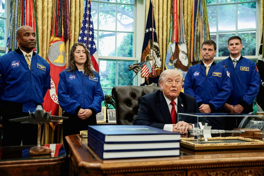 U.S. President Donald Trump meets Artemis II astronauts in the Oval Office at the White House in Washington