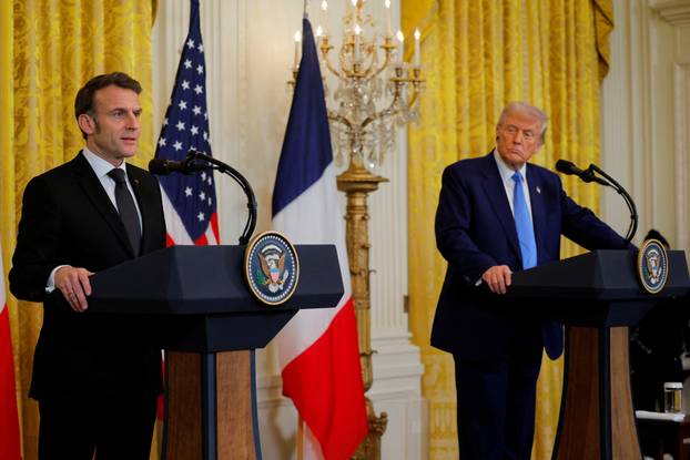 U.S. President Donald Trump and French President Emmanuel Macron attend a press conference at the White House in Washington