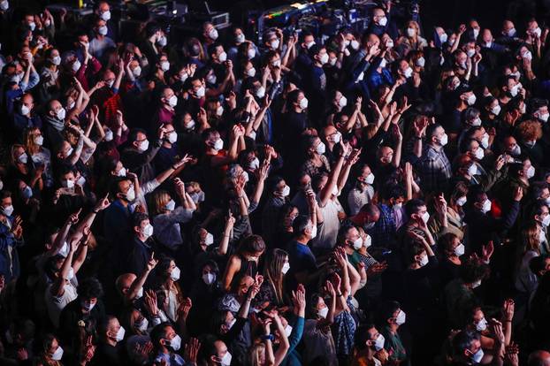 People attend first massive concert since the beginning of COVID-19 pandemic in Barcelona