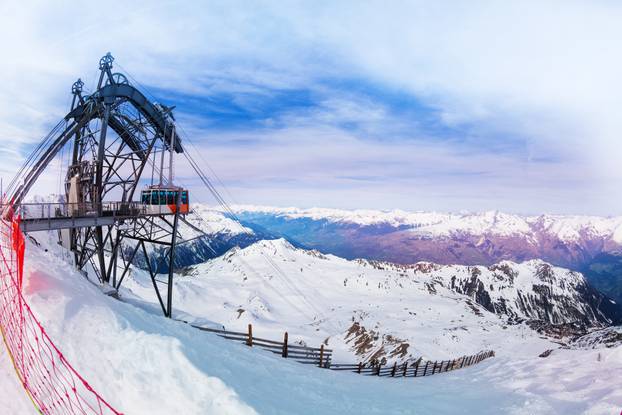 Les Arcs view with mountain ridges and cable car