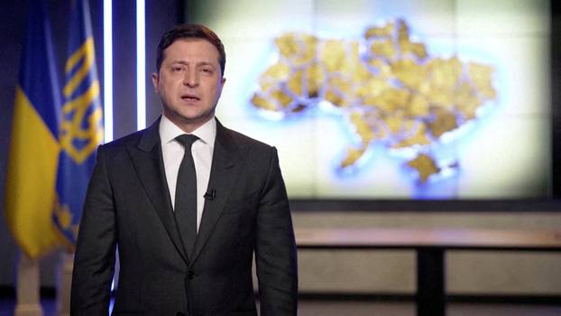 Ukrainian President Volodymyr Zelenskiy speaks in Russian during an address in Kyiv