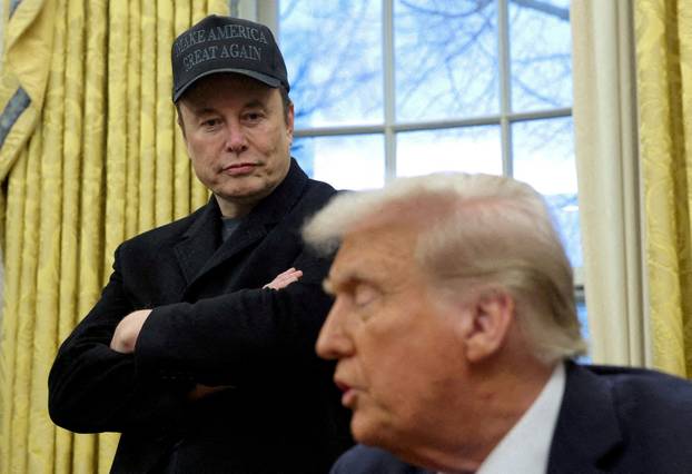 FILE PHOTO: Elon Musk and President Donald Trump are shown in the Oval Office in Washington