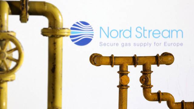 Illustration shows natural gas pipeline and Nord Stream logo