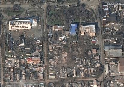 A satellite image shows destroyed homes and buildings, amid Russia's invasion of Ukraine, in Mariupol