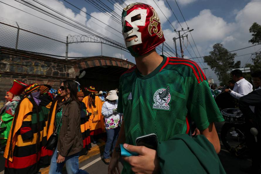 Fans make their way to the stadium ahead of the opening match of the 2026 FIFA World Cup in Mexico City