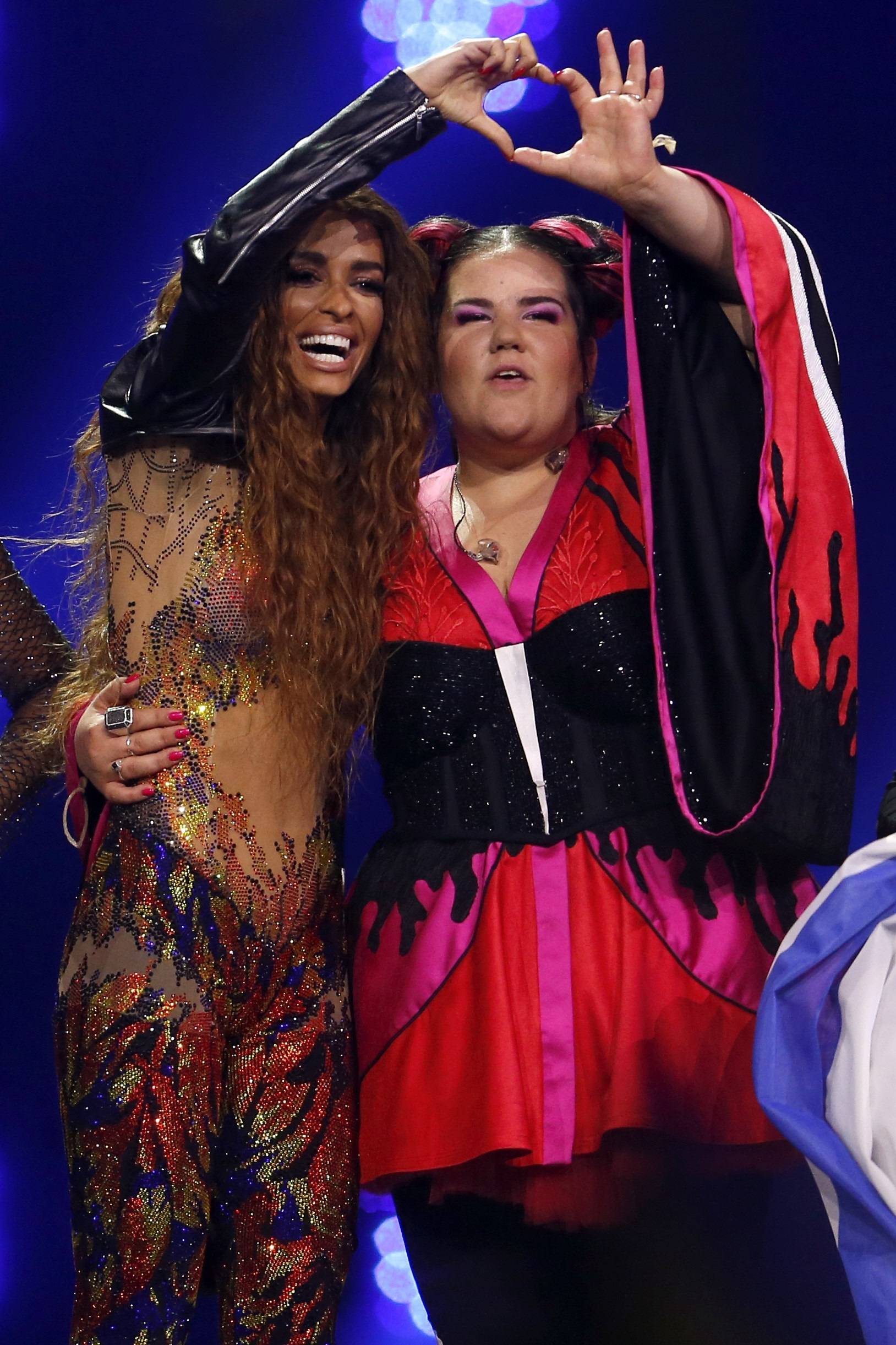 Cyprusâs Eleni Foureira and Israelâs Netta react after the Semi-Final 1 for Eurovision Song Contest 2018 in Lisbon