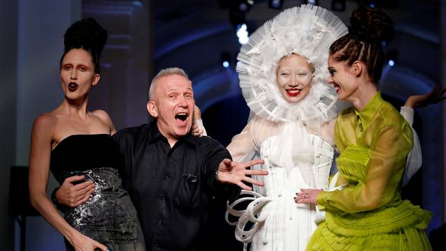 FILE PHOTO: French designer Jean Paul Gaultier appears with models at the end of his Haute Couture Fall/Winter 2016/2017 collection in Paris