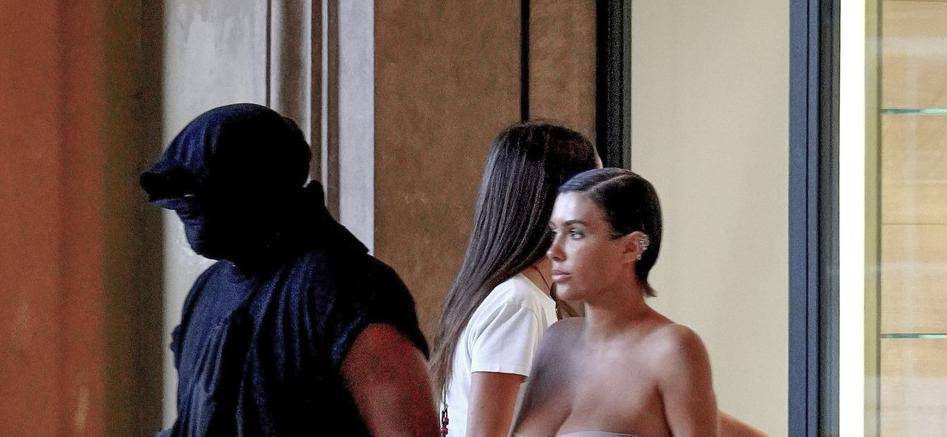 *PREMIUM-EXCLUSIVE* *MUST CALL FOR PRICING* The American Rapper Kanye West in his usual incognito mode is seen with his partner Bianca Censori as they step out of an Italian hotel for some shopping in the center of Florence.