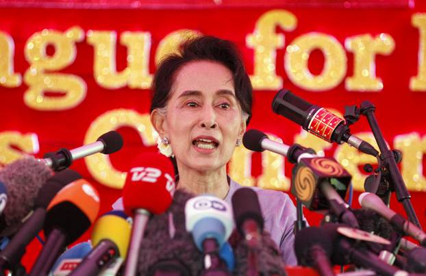 FILE PHOTO: Myanmar's National League for Democracy Party leader Aung San Suu Kyi speaks to media about the upcoming general elections, during a news conference at her home in Yangon