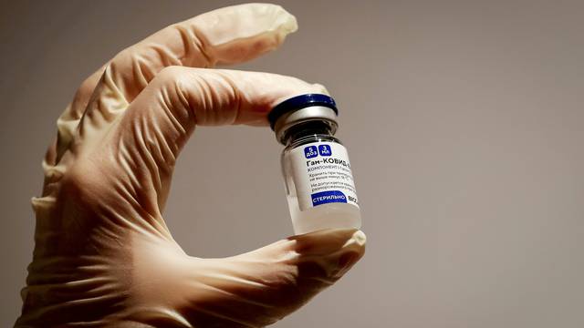 FILE PHOTO: FILE PHOTO: A medical specialist holds a vial of Sputnik V vaccine against the coronavirus in a department store in Moscow, Russia