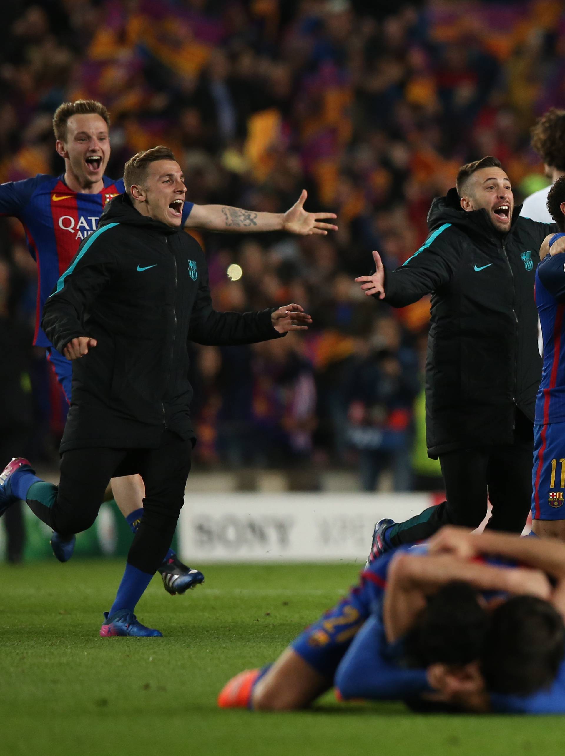 Barcelona players celebrate after the game