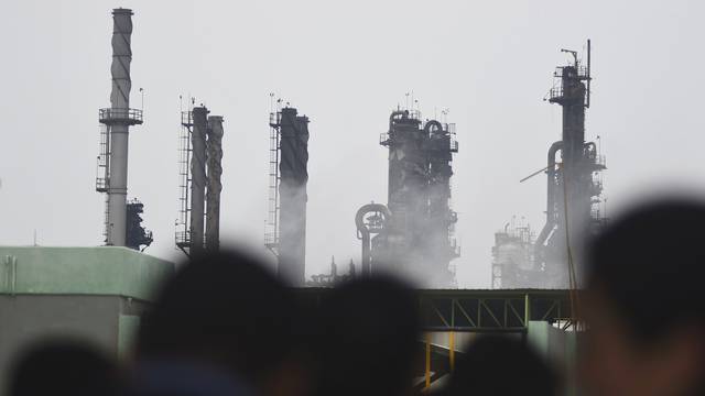 Smoke rises from the explosion site at Mexican national oil company Pemex's Pajaritos petrochemical complex in Coatzacoalcos