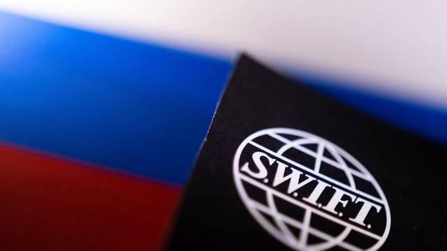 Illustration shows Swift logo and Russian flag