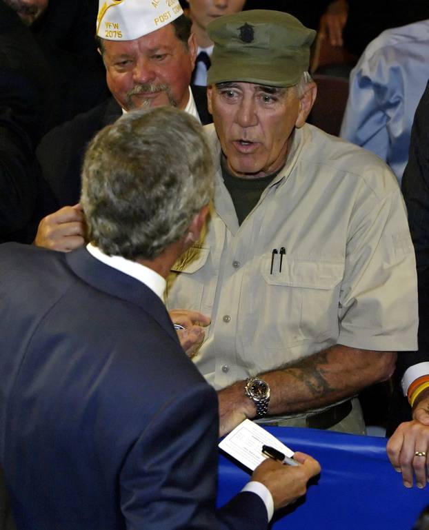 FILE PHOTO - U.S. President Bush talks to actor and veteran R. Lee Ermey at VFW convention in Salt Lake City.