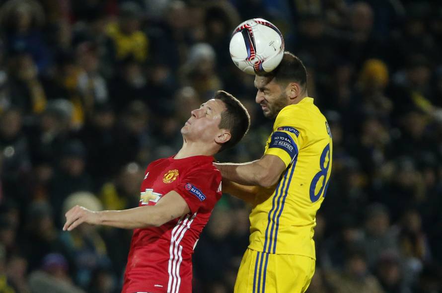FC Rostov's Aleksandru Gatcan in action with Manchester United's Ander Herrera