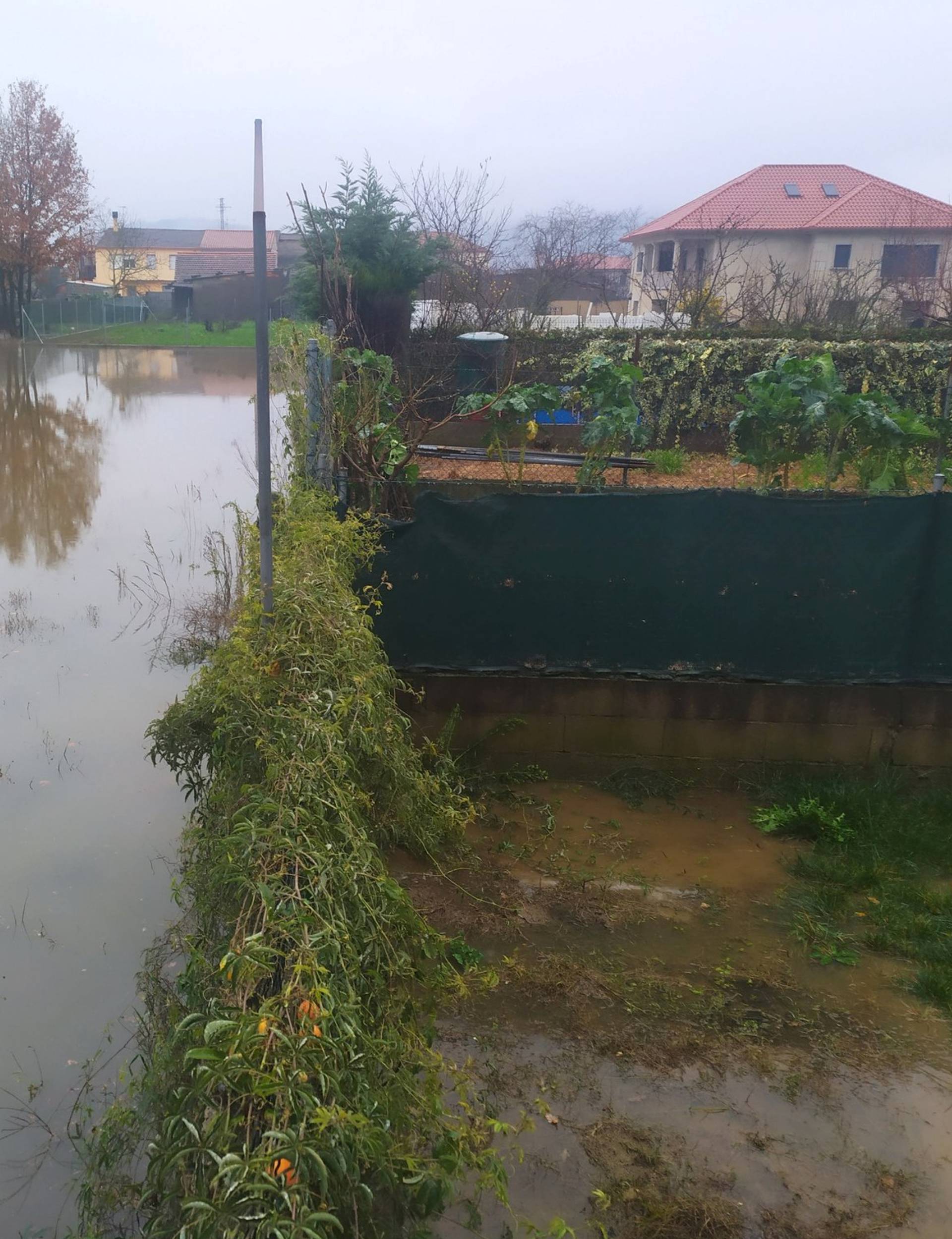 A flooded area is pictured after Storm Elsa swept throughout Galicia, in the province of Ourense