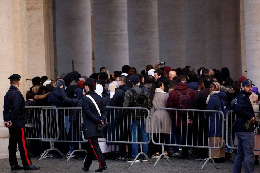Faithful pay homage to former Pope Benedict in St. Peter's Basilica at the Vatican