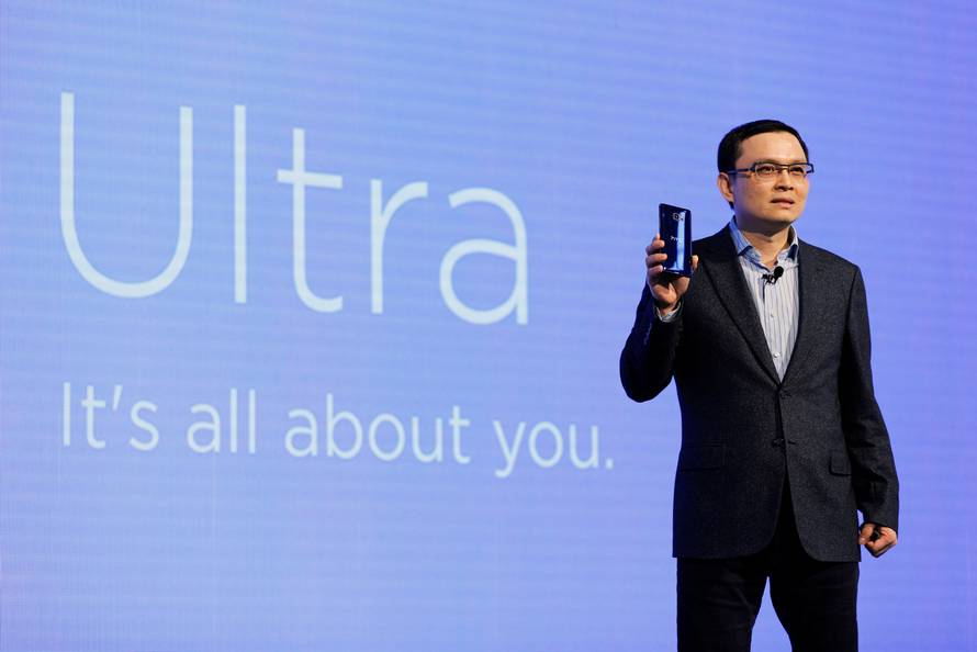 Chang Chia-Lin, President of Global Sales of HTC speaks holding a new smartphone "U Ultra" during its launch event in Taipei