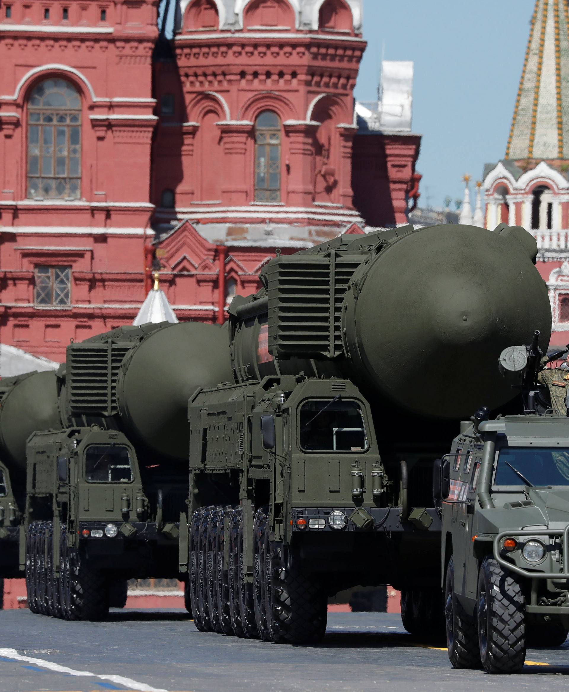 Russian servicemen drive military vehicles during the Victory Day parade at the Red Square in Moscow