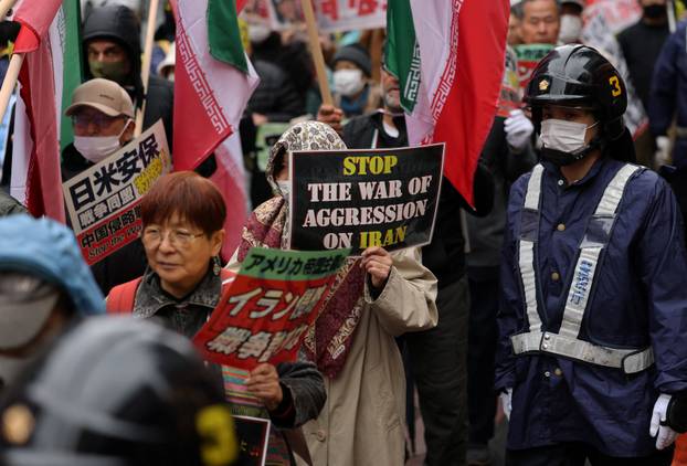 Protesters take part in an anti-U.S., anti-war and anti-Prime Minister Sanae Takaichi rally, in Tokyo