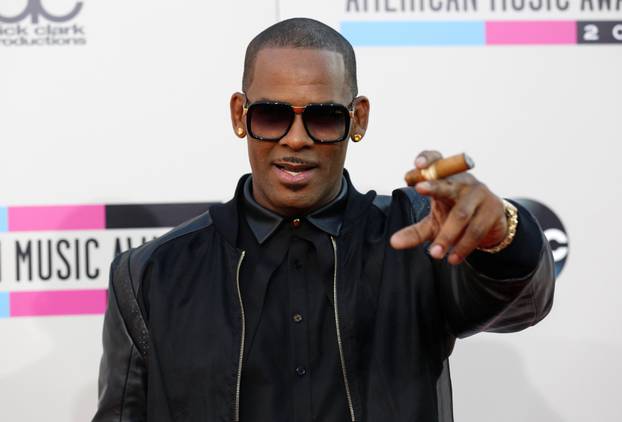 FILE PHOTO: Singer R. Kelly arrives at the 41st American Music Awards in Los Angeles