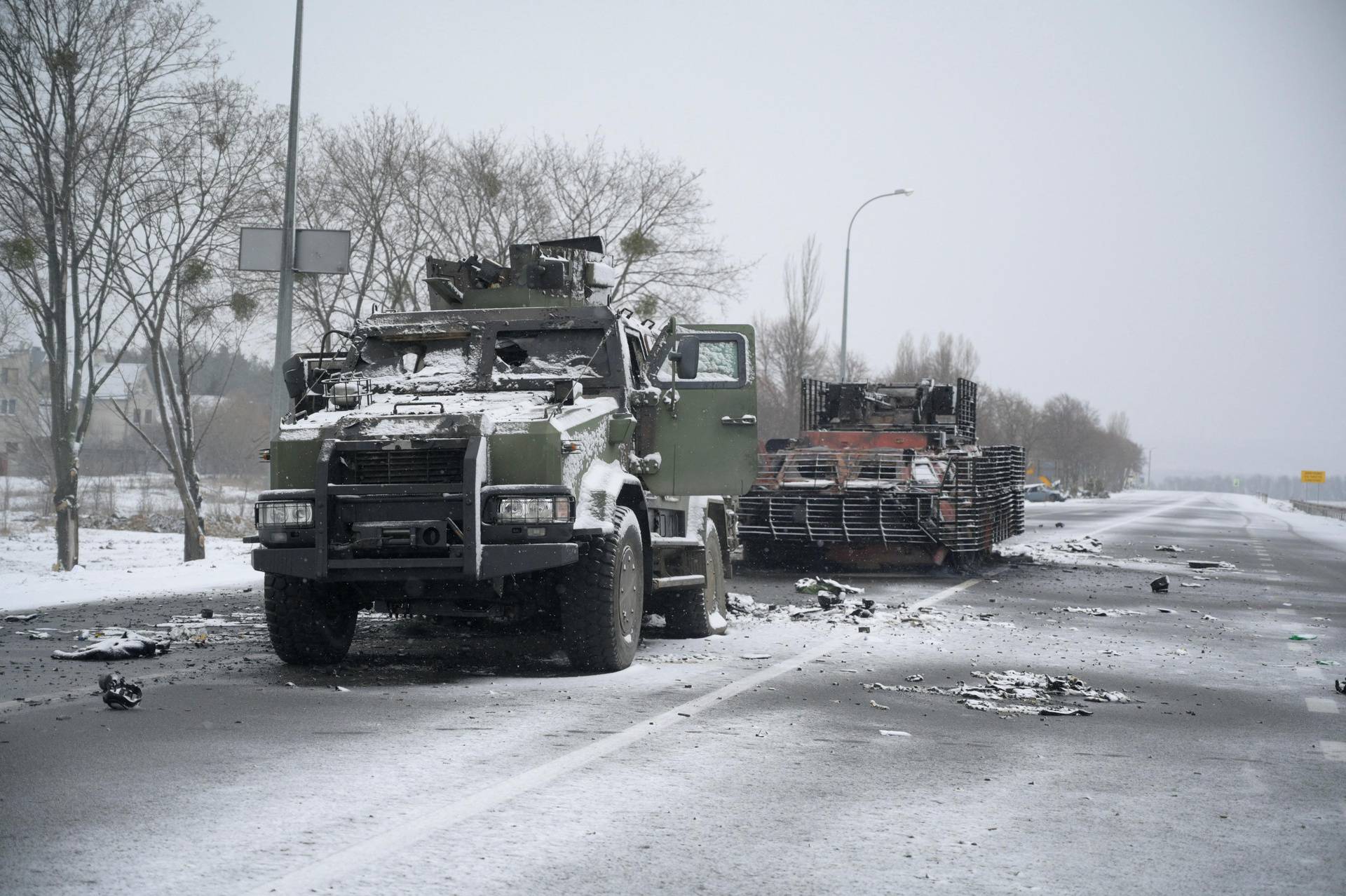 A view shows destroyed military vehicles on a road in Kharkiv