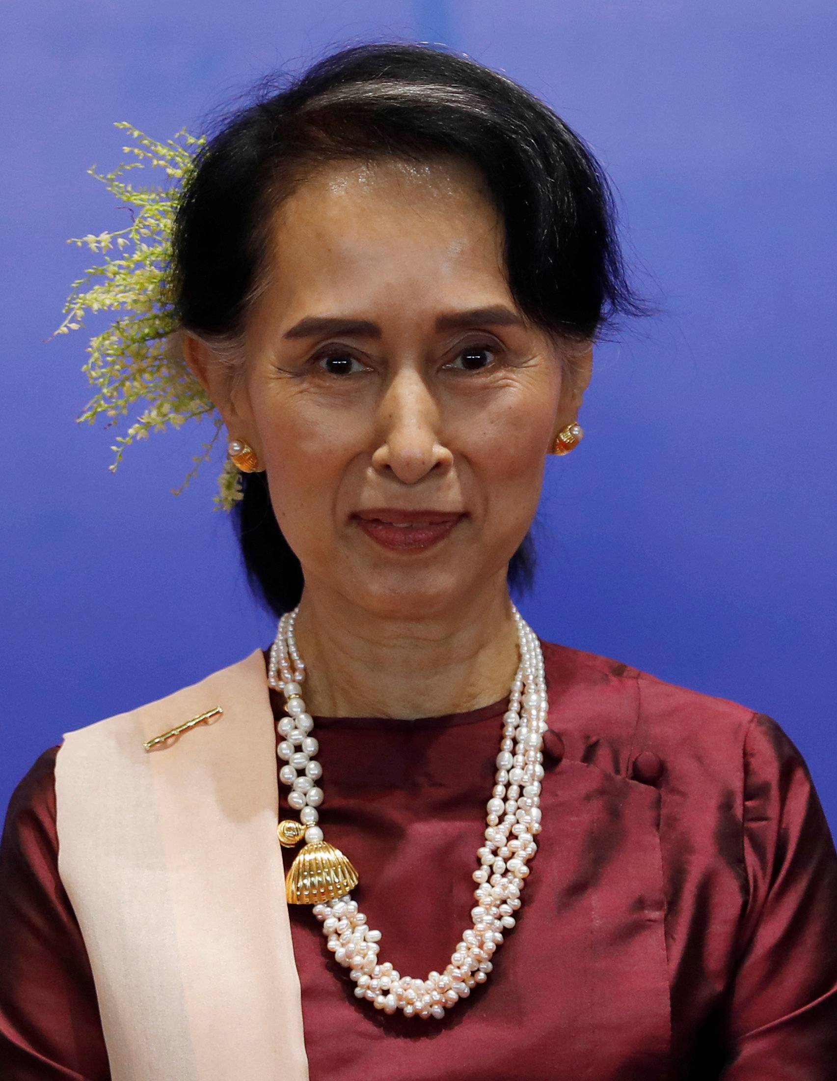 State Councilor Aung San Suu Kyi (C) poses for a photo at a photo session during the Second Anniversary of Nationwide Ceasefire Agreement (NCA) in Naypyitaw